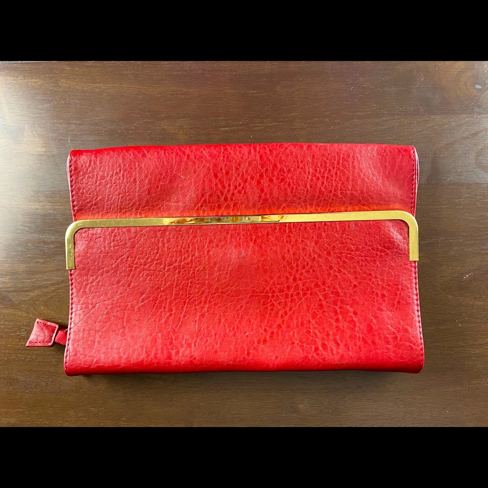 Red with gold hand bag